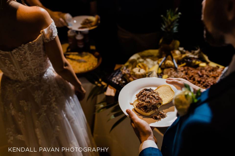 Wedding couple at their buffet