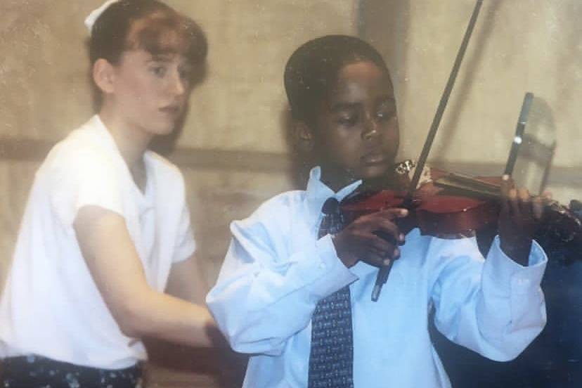 Young Omari playing recital