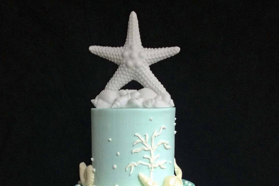 Blue beach wedding cake