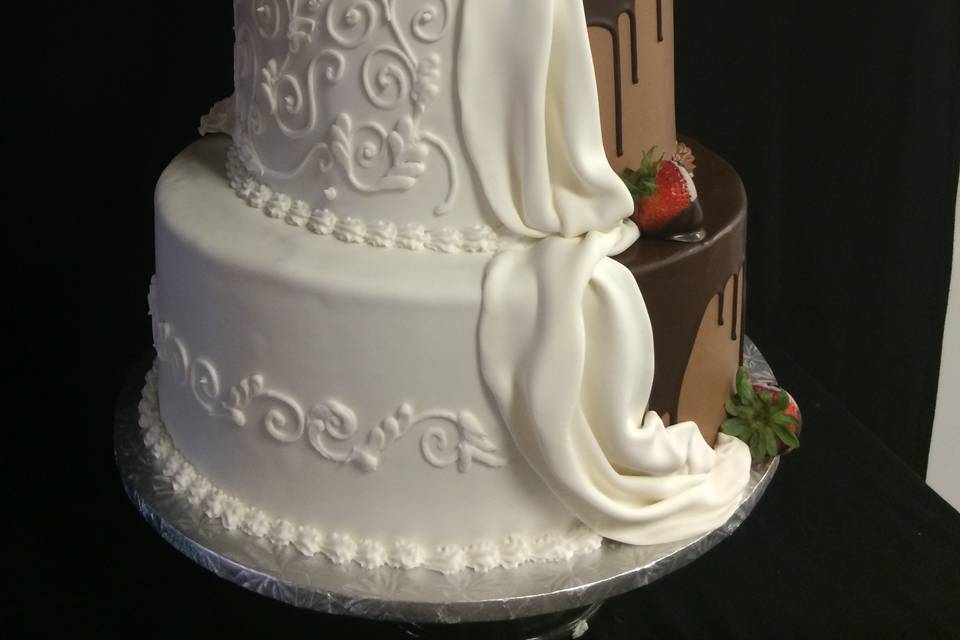 All white wedding cake with white flowers