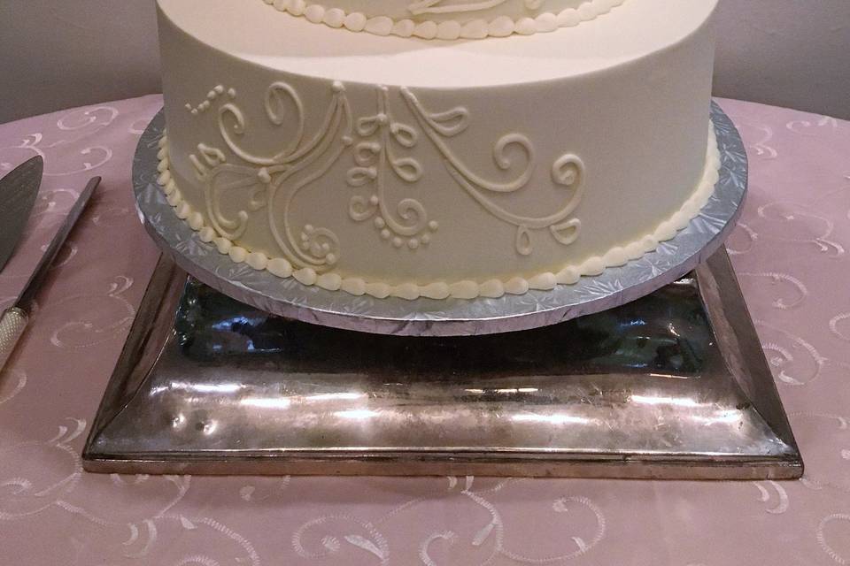 White and gold wedding cake