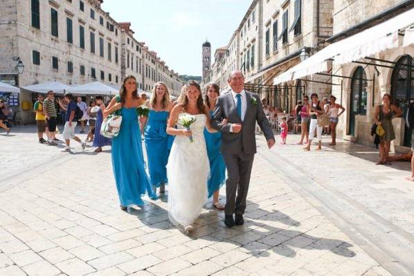 The couple with the bridesmaids