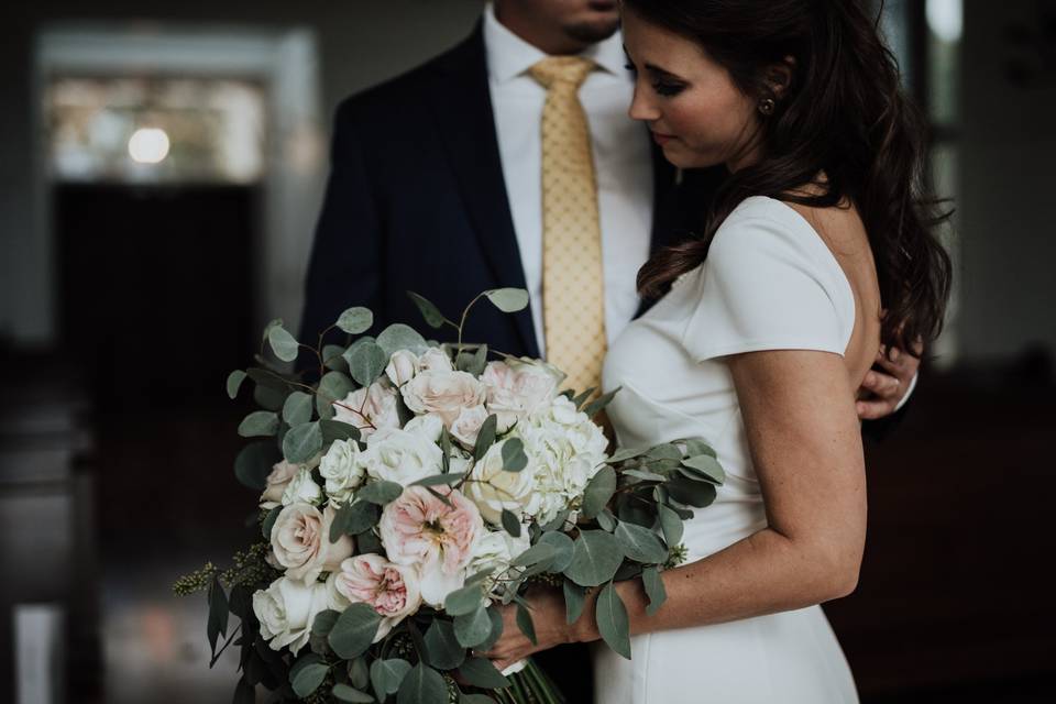 Bride holding flowers