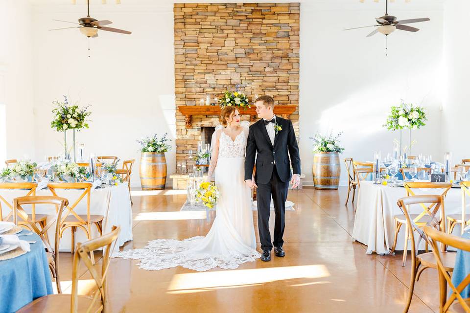 Couple in front of fireplace