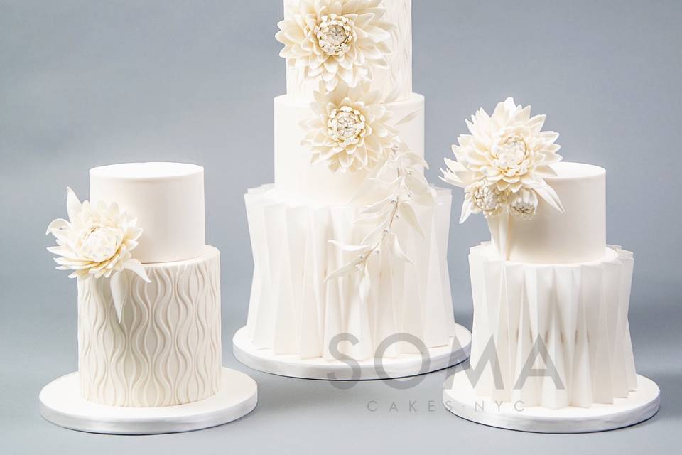 White dahlia wedding cake.