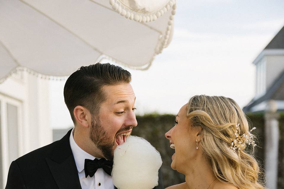 Couples sharing cotton candy