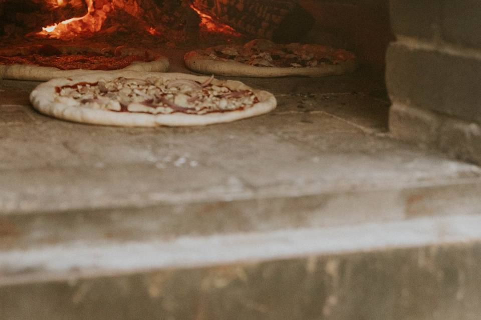 Pizzas Cooking