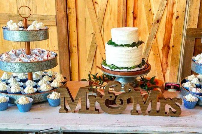 Wedding cake and cupcake table