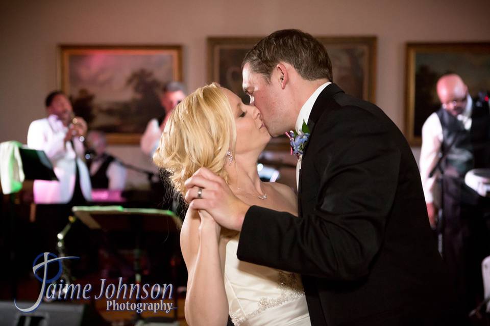 Kiss at the reception.