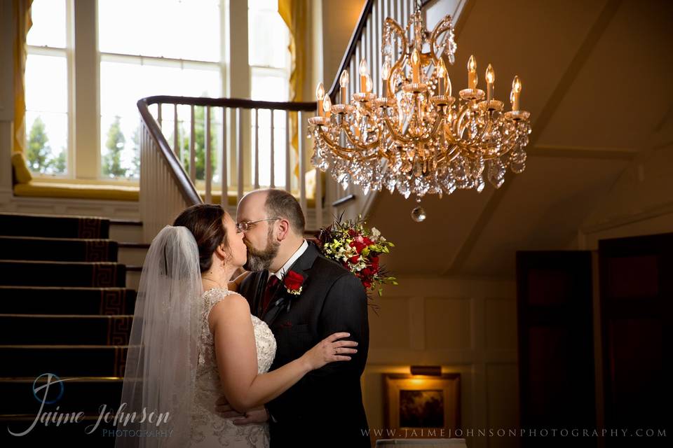 Portrait with chandelier.