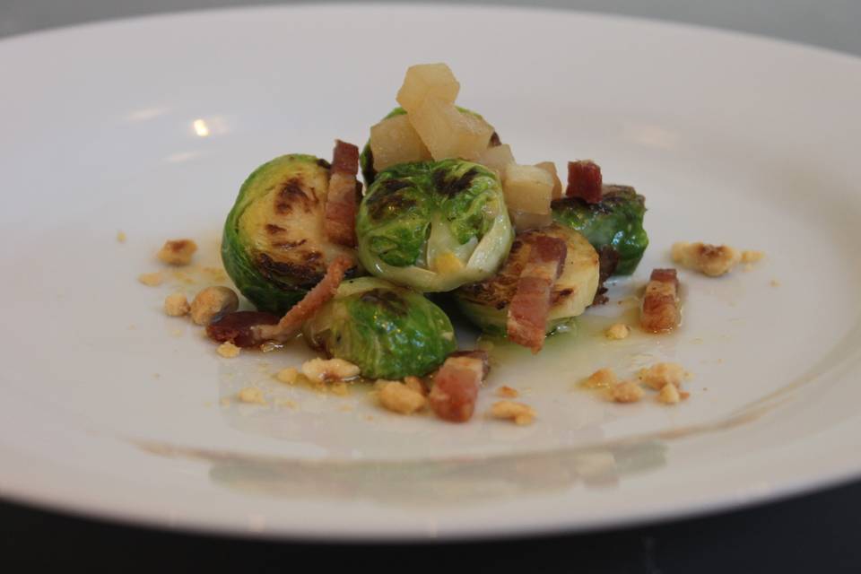 Braised brussels sprouts with caramel turnips, pancetta and hazelnuts