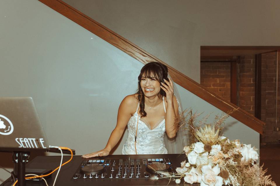 Bride takes over DJ Table