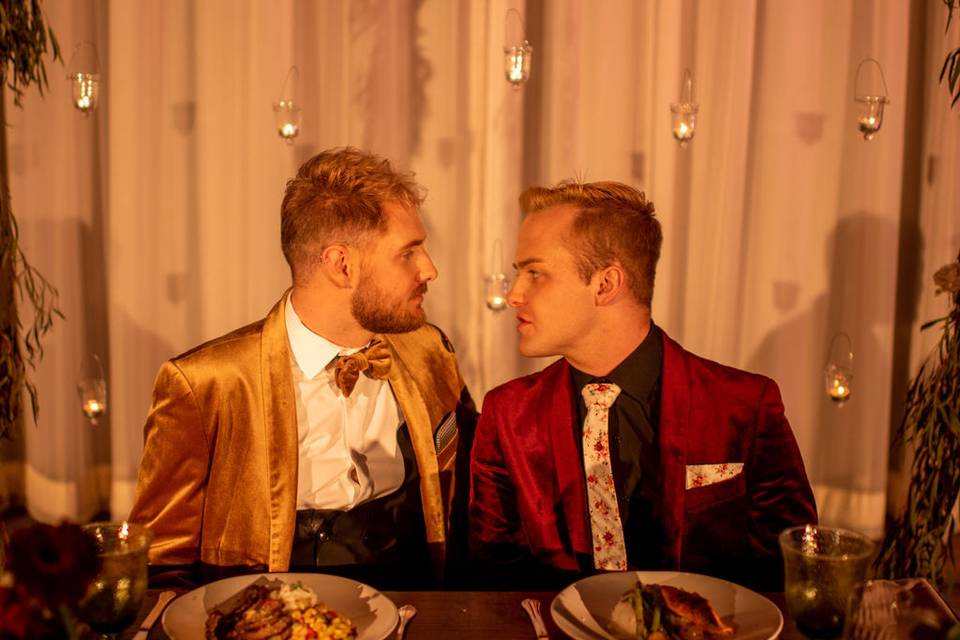 Grooms at sweetheart table