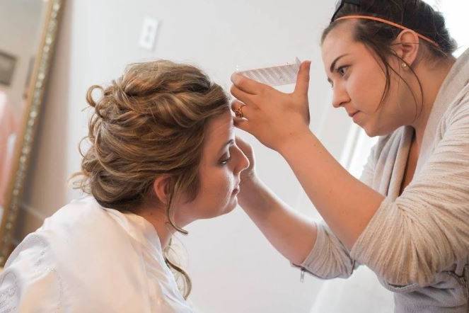 Bride and her makeup artist