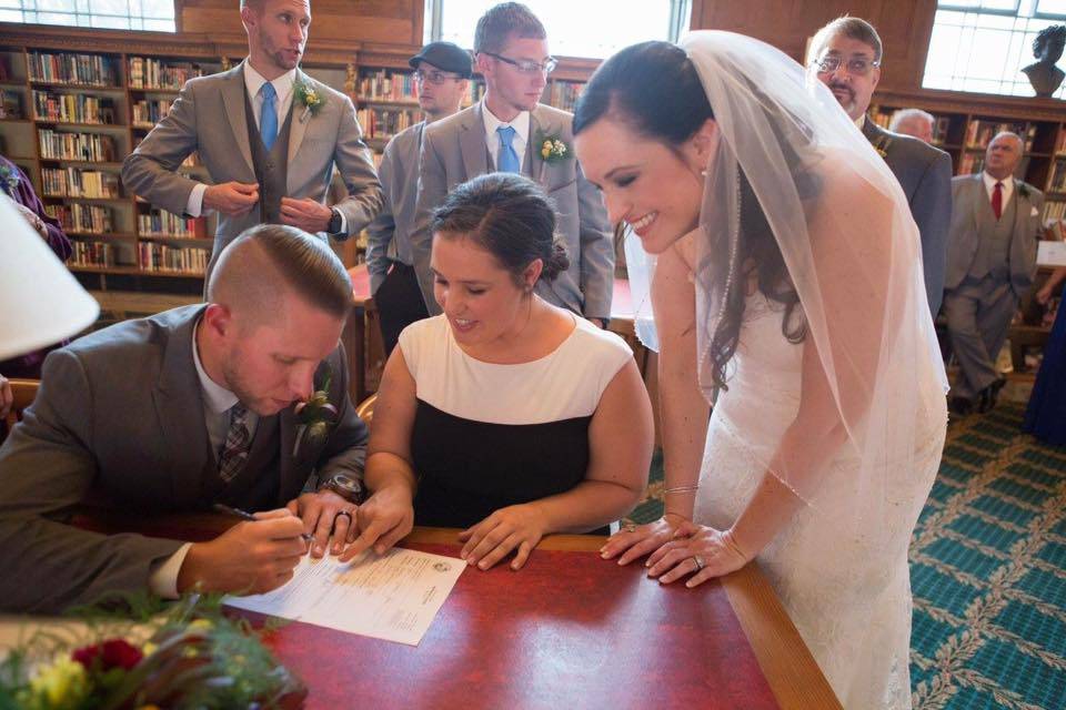 Signing the marriage license