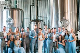 The couple with the bridesmaids and groomsmen