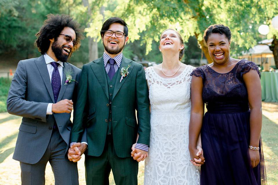 The couple with the bridesmaid and groomsman