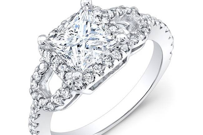 ENG-1008
This 14KT white gold engagement ring features a halo and split-shank design with 0.70PTS of 48 prong-set round diamonds. It may also feature the center stone of your choice!
Call 213.626.6012 or chat with us at www.goldempirejewelry.com to get the best deal for this beautiful piece!