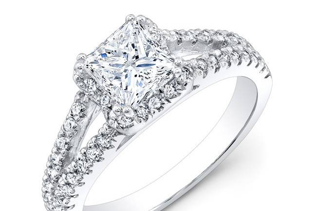 ENG-1009
This 14KT white gold engagement ring features a halo and split shank design with 0.35PTS of 48 prong-set diamonds. It may also feature the center stone of your choice!
Call 213.626.6012 or chat with us at www.goldempirejewelry.com to get the best deal for this beautiful piece!