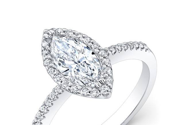 ENG-5588
This 14KT white gold engagement ring features 0.28PTS of 40 round diamonds set on its shank and halo. The center stone is a marquise-shaped diamond that weighs 0.76PTS.
Call 213.626.6012 or chat with us at www.goldempirejewelry.com to get the best deal for this beautiful piece!