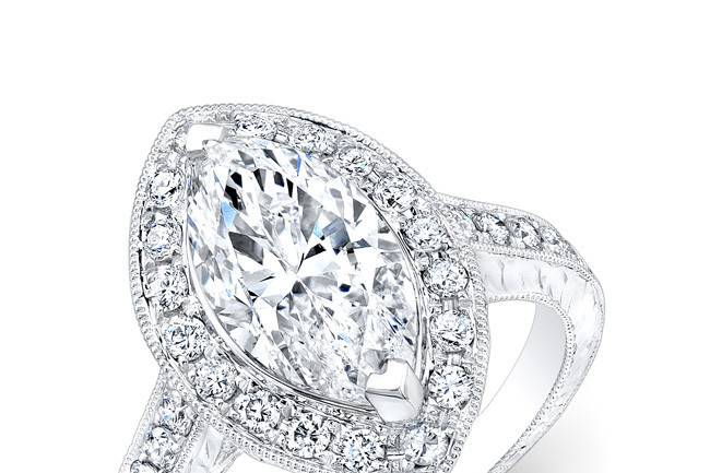 ENG-5602
This 18KT white gold engagement ring features a halo design with 0.67PTS of 32 round diamonds on its shank and halo. The center stone is a marquise-shaped diamond that weighs 2.78CTS.
Call 213.626.6012 or chat with us at www.goldempirejewelry.com to get the best deal for this beautiful piece!