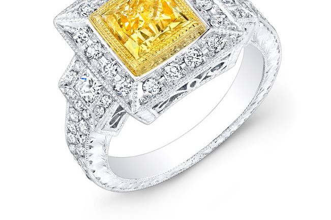 LAD-8164
This 18KT two tone (white & yellow gold) fashion ring features 1.00CT of pave-set round diamonds and 0.30PTS of princess-cut side diamonds. The center stone is a princess-cut yellow diamond that weighs 1.53CTS.
Call 213.626.6012 or chat with us at www.goldempirejewelry.com to get the best deal for this beautiful piece!
