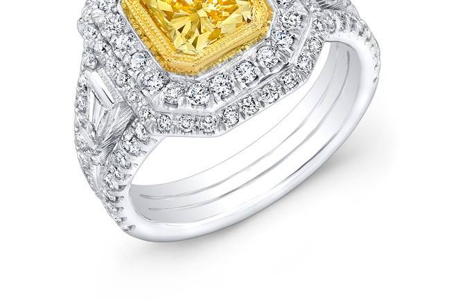 LAD-8166
This 18KT two-tone (white & yellow gold) fashion ring features 0.38PTS of baguettes on the side and 1.45CTS of pave-set round diamonds. The center stone is a radiant-cut yellow diamond that weighs 2.03CTS.
Call 213.626.6012 or chat with us at www.goldempirejewelry.com to get the best deal for this beautiful piece!
