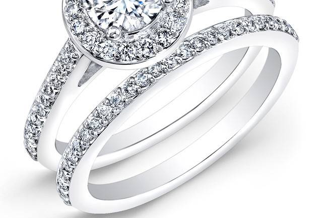 BRD-2010
This 14KT white gold wedding set features a halo design with 0.77PTS of 93 round diamonds. It may also feature the center stone of your choice!
Call 213.626.6012 or chat with us at www.goldempirejewelry.com to get the best deal for this beautiful piece!
