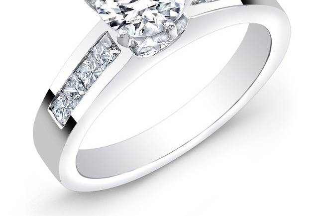 BRD-2008A
This 14KT white gold engagement ring features 8 channel-set princess cut diamonds. It may also feature a center stone of your choice!
Call 213.626.6012 or chat with us at www.goldempirejewelry.com to get the best deal for this beautiful piece!