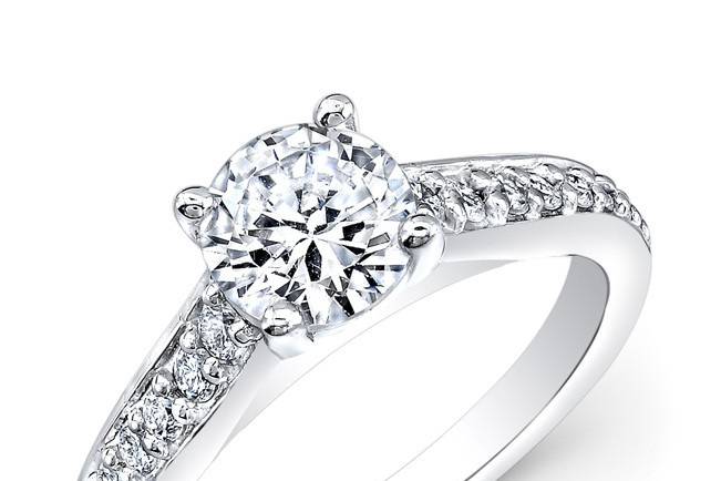 ENG-1003A
This 18KT white gold engagement ring features 0.56PTS of 35 round diamonds. It may also feature the center stone of your choice!
Call 213.626.6012 or chat with us at www.goldempirejewelry.com to get the best deal for this beautiful piece!