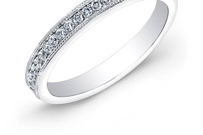 BRD-2006B
This vintage-style 14KT white gold wedding band features a milgrain finish along the edges of 23 round diamonds that weigh 0.20PTS.
Call 213.626.6012 or chat with us at www.goldempirejewelry.com to get the best deal for this beautiful piece!
