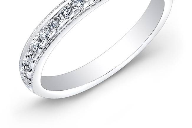 ENG-5572B
This 14KT white gold wedding band features 15 pave-set round diamonds and was designed to accomodate ENG-5572A.
Call 213.626.6012 or chat with us at www.goldempirejewelry.com to get the best deal for this beautiful piece!