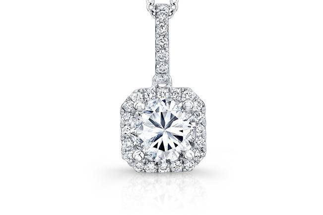 PND-8265
This 18KT white gold pendant features a halo design with approximately 28 round diamonds that weigh 0.22PTS. It may also feature the chain of your choice!
Call 213.626.6012 or chat with us at www.goldempirejewelry.com to get the best deal for this beautiful piece!