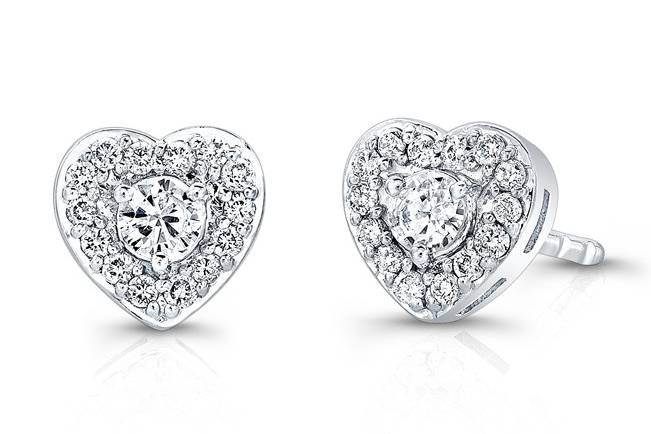 EAR-4012 (http://www.goldempirejewelry.com/fashion/earrings/studs/ear-4012.html)
This 14kt white gold pair of heart-shaped earrings features 0.14 points of 28 full-cut round brilliant diamonds on the halo and 0.12 points total of 2 round brilliant center diamonds.