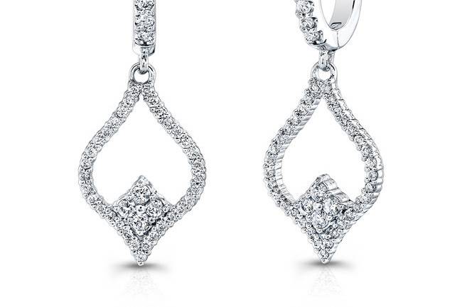 EAR-4016 (http://www.goldempirejewelry.com/fashion/earrings/ear-4016.html)
This pair of 14kt white gold dangling earrings features 92 full-cut round brilliant diamonds that weigh 0.80 points in total.
Call for price 213.626.6012