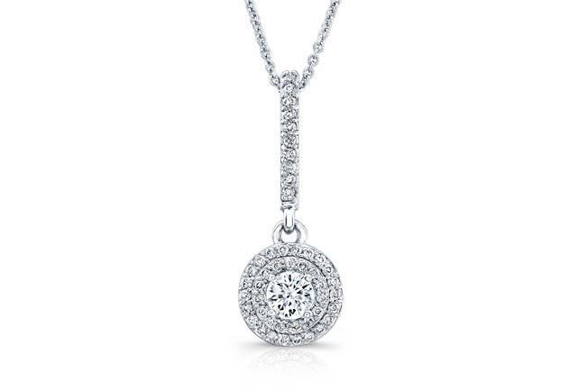 PND-6009 (http://www.goldempirejewelry.com/fashion/pendants/pnd-6009.html)
This 14kt white gold pendant features a 0.25 point round brilliant center and a halo design with 0.20 points of 47 full-cut round brilliant diamonds that are pre-set. It may also feature the center stone of your choice!