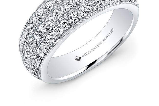 LAD-8147 (http://www.goldempirejewelry.com/fashion/rings/lad-8147.html)
This 18KT white gold eternity band features 2.57CTS of 230 micro-pave set round diamonds.
Call for Price 213.626.6012