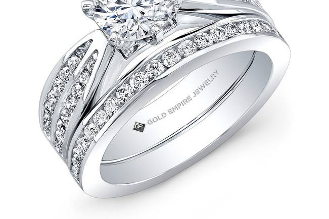 BRD-2022 (http://www.goldempirejewelry.com/bridal/brd-2023.html)
This modern-style 14kt white gold wedding set features 0.82 points of 56 full-cut round brilliant diamonds that are channel-set. It may also feature the center stone of your choice!