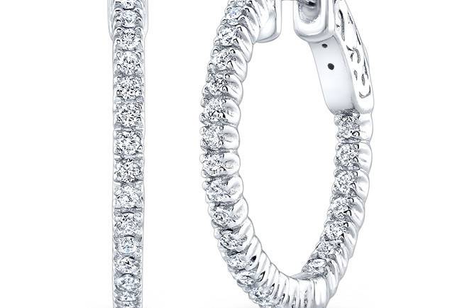 EAR-4024
This pair of 14kt white gold hoop earrings features 50 full-cut round brilliant diamonds that weigh 0.56 points in total.