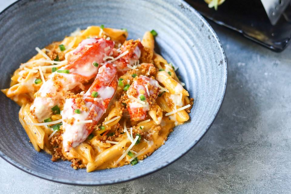 Cheesy lobster pasta and lobster tacos