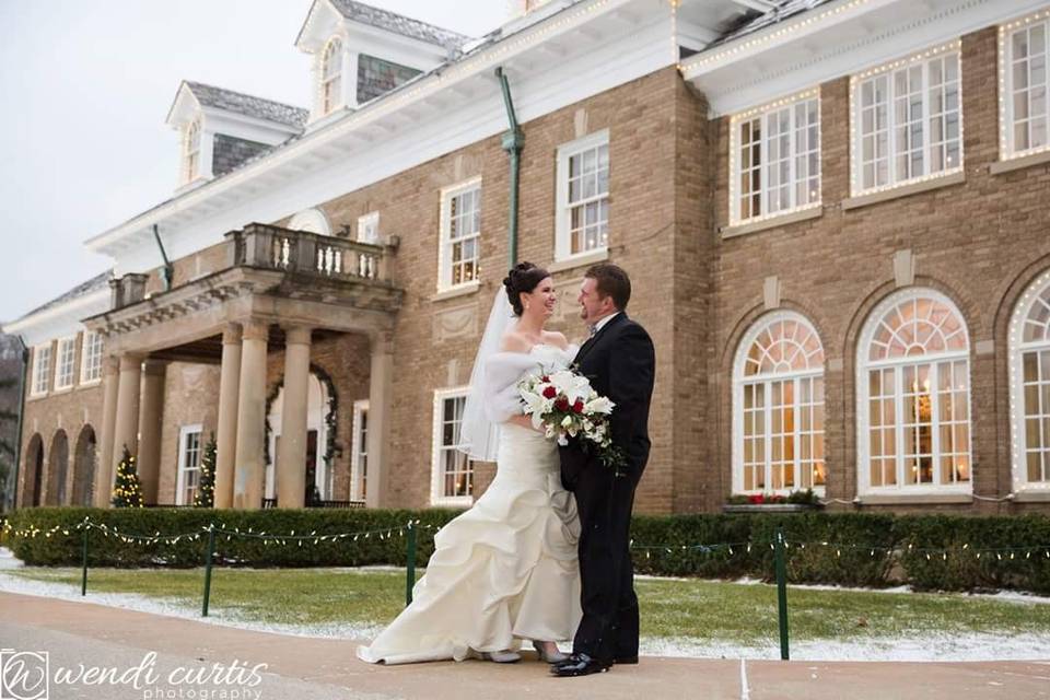 Couple photo by the mansion