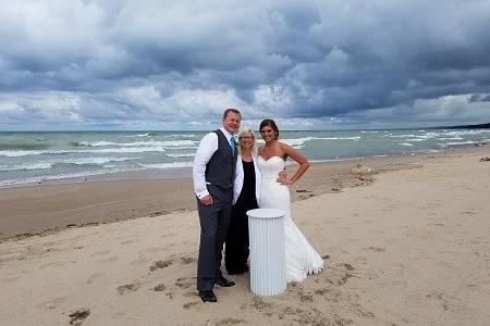 Newlyweds and the officiant