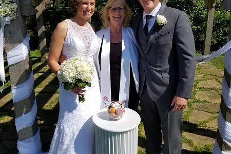 Newlyweds and the officiant