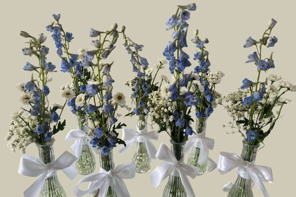 Hanging bud vases on the chair