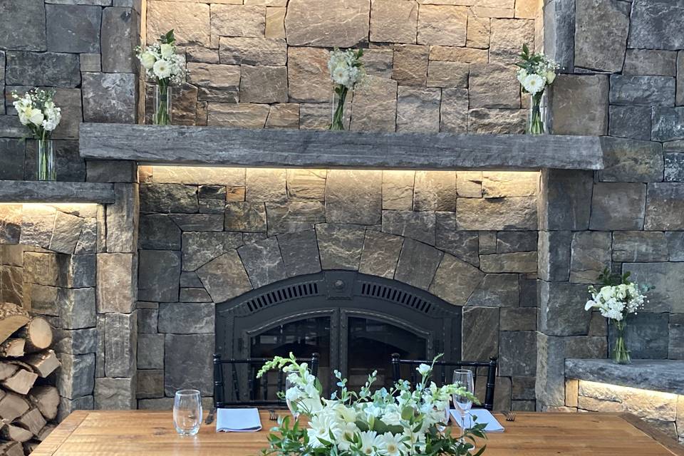 Sweetheart table and fireplace