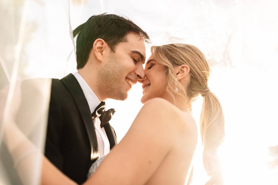 Bride and groom in the rain