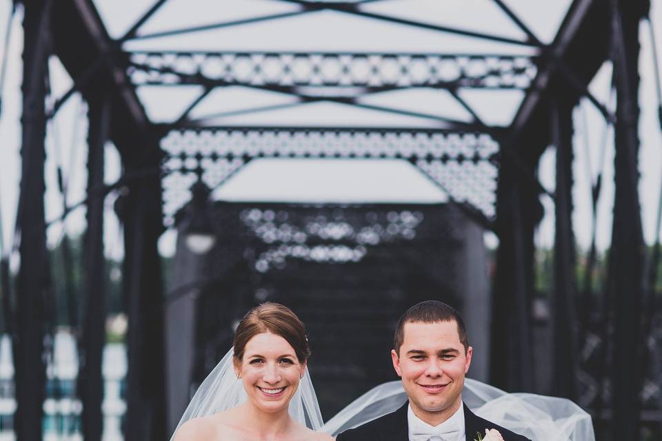 Couple walking on a bridge