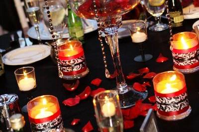 Short centerpiece featuring roses, lilies, gerber daisies, carnations, dahlias and alstroemeria.