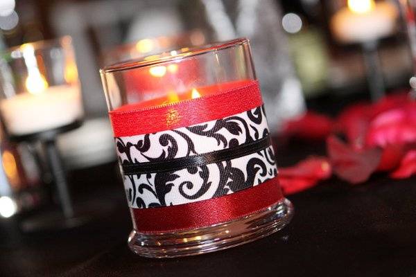 Hand wrapped votive candle holder, featured on guest tables and throughout the reception space.