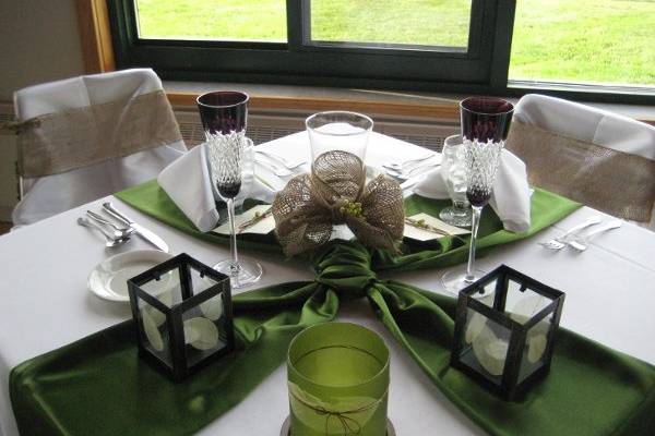 Sweetheart table with burlap chair sashes and handmade 